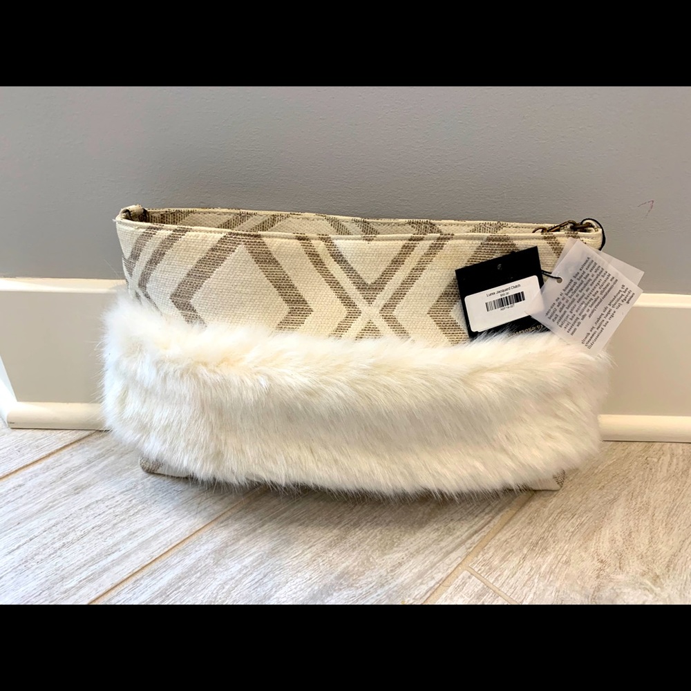 Lured jacquard clutch